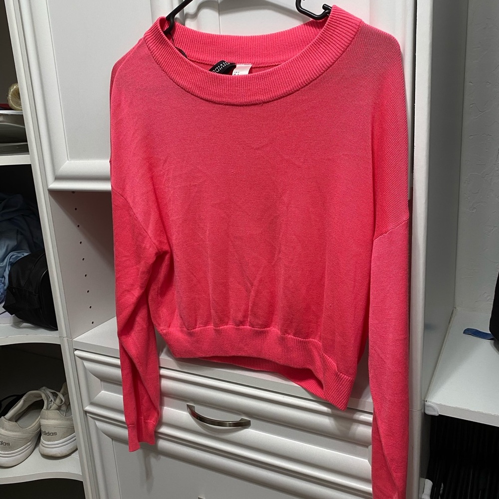 Divided pink sweater